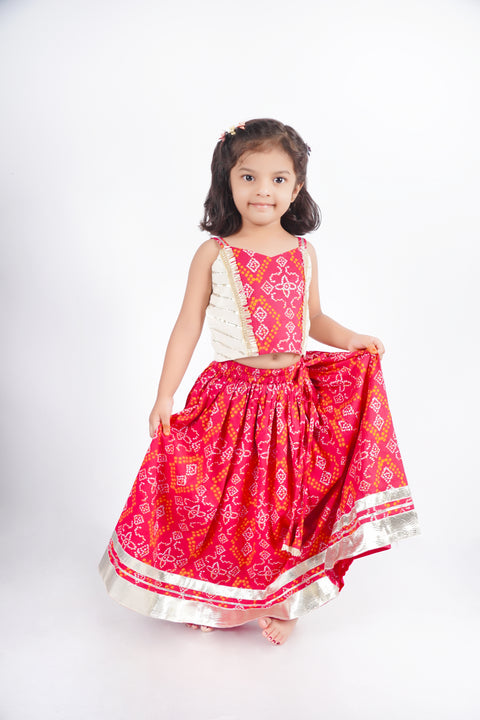 Off-white and pink Bandhani print lehenga set