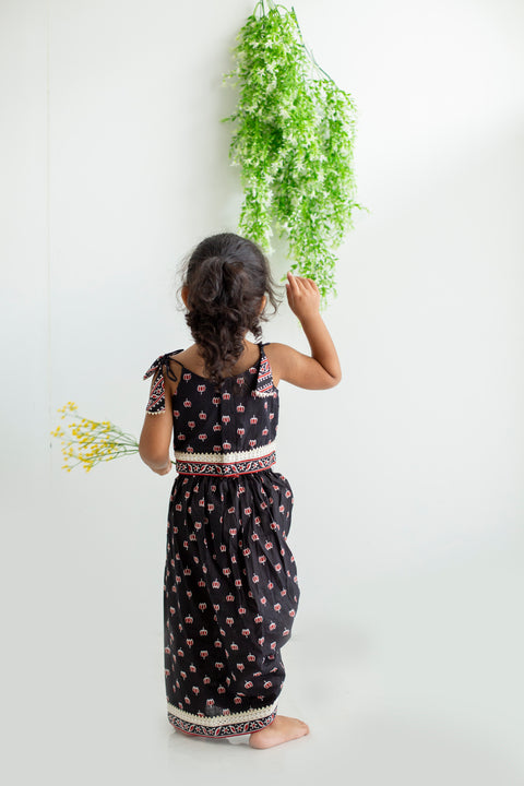 Black crop top and draped skirt