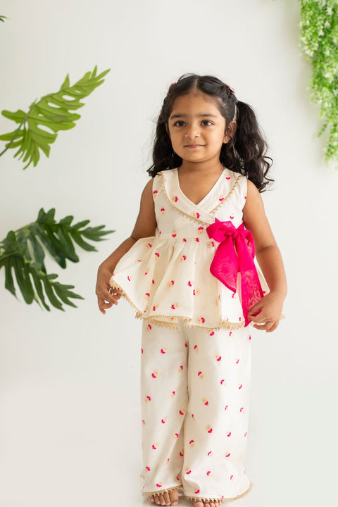 White peplum set with flared palazzo